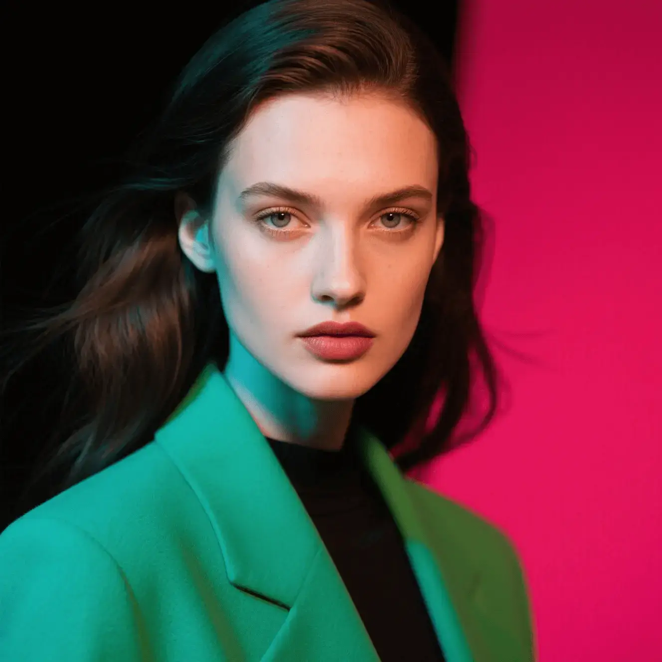 Woman in green blazer portrait: source image for Viddo AI image to image conversion